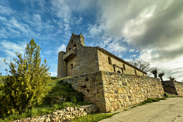 Obraz premium Historic stone church of Santa Maria and San Roque in Quintanilla de las Torres