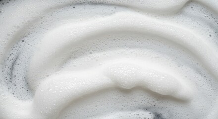 Obraz premium Close up texture of thick white detergent suds creating a fluffy background, suitable for cleaning, hygiene, and washing concepts ,light ,washing ,suds