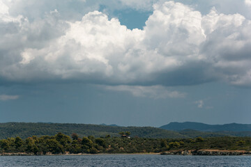clouds.sea.greece. island.