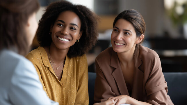 Faceless therapy with happy women conversation on sofa defocused counseling background speaking with psychologist mental health communication support consulting discussion tog - Powered by Adobe