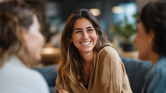 Faceless therapy with happy women conversation on sofa defocused counseling background speaking with psychologist mental health communication support consulting discussion tog