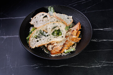 Salmon Fillet With Greens and Parmesan Crumbs Over Bread Slices