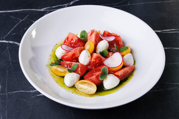 Colorful Tomato Burrata Salad With Radish, Olives, And Fresh Herbs