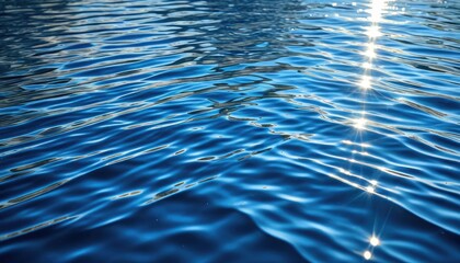 Sparkling Blue Water Surface with Sun Glare - Ocean Waves and Ripples Reflecting Sunlight, Calming Coastal Scene
