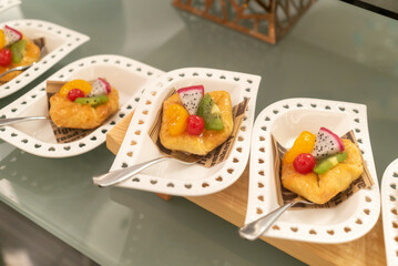 Colorful Fruit Tartlets on Dessert Plates