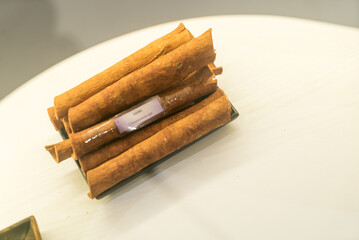 Aromatic Cinnamon Sticks on White Surface