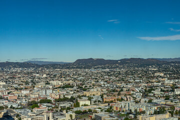 In the distance is Hollywoodland Sign and Griffith Observatory in the Santa Monica Mountains.  from InterContinental Los Angeles Downtown by IHG, California