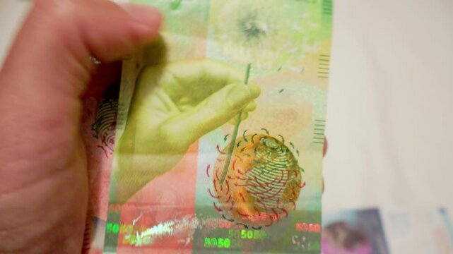thorough visual analysis of swiss franc banknotes highlighting security and denomination features