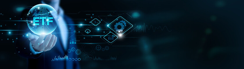 Businessman hand hold ETF and global networking, opening diversified investment. Real-time trading enables flexibility, stable portfolios enhance investor confidence.