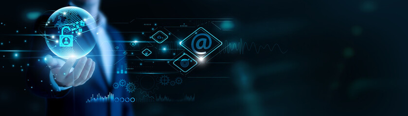 Businessman hand hold Information Security and global networking, securing data assets. Encrypted systems prevent threats, robust policies safeguard operations.