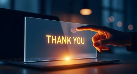 Hand touching thank you message glowing on modern laptop screen