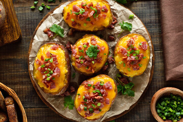 Baked stuffed potatoes with bacon, green onion and cheddar cheese