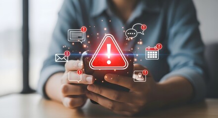 Person holding phone with digital warning icons and alerts