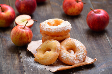 Homemade donuts with apples and powdered sugar