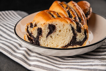 poppy seed roll braided poppy seed brioche sweet pastry dessert poppy seed roll tasty snack fresh gourmet food table setting rustic food top view copy space
