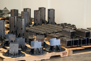 Welded metal structures and supports for a wooden house