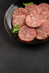 Sausage with garlic and spices slices of salami meat tasty snack fresh gourmet food background on the table rustic food top view copy space