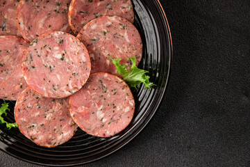Sausage with garlic and spices slices of salami meat tasty snack fresh gourmet food background on the table rustic food top view copy space