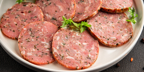 Sausage with garlic and spices slices of salami meat tasty snack fresh gourmet food background on the table rustic food top view copy space