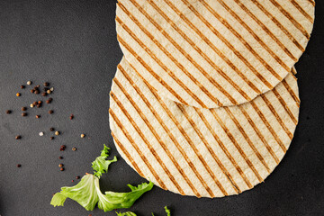 Lavash grill flatbreads ready to eat tasty snack fresh gourmet food background on table rustic food top view copy space
