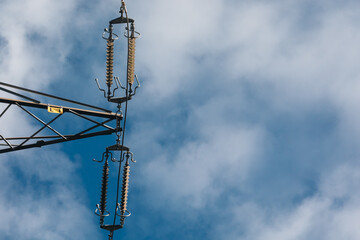 High Voltage Power Line Insulators Against Sky