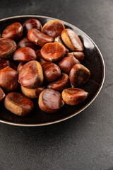Edible chestnuts delicious treat tasty snack fresh gourmet food background on table rustic food top view copy space