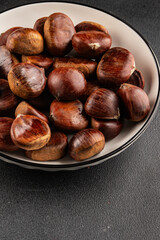 Edible chestnuts delicious treat tasty snack fresh gourmet food background on table rustic food top view copy space
