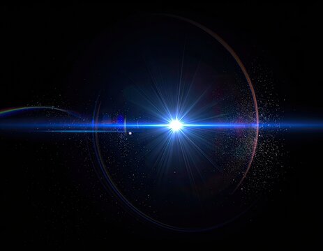 Bright blue starburst with lens flare, circular halo, and particles on black