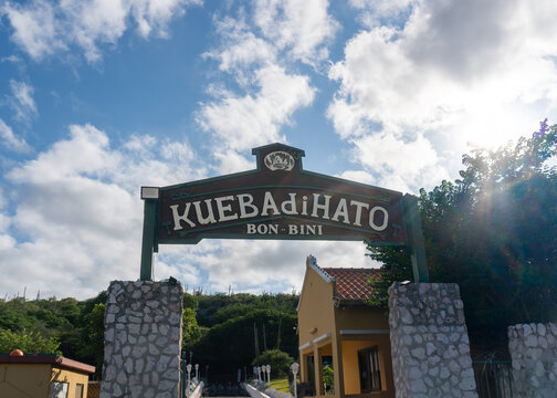 Willemstad, Curacao: Hato Caves (Kueba di Hato) entrance sign welcomes (Bon Bini) visitors to cave system park.