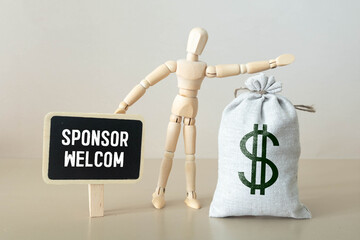 SPONSORS WELCOME on wooden blocks. Sponsorship donation support business startup concept