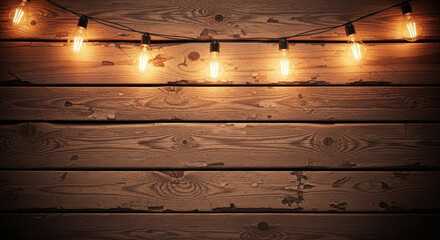 String lights hanging on wooden wall in rustic style  