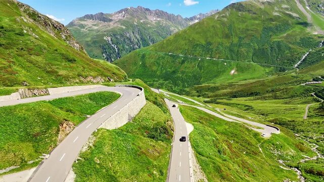 Aerial drone view of scenic road Susten Pass mountain pass in Swiss Alps in summer. Switzerland 4k.