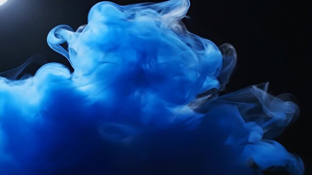 Ultra-slow deep blue smoke waves illuminated softly, creating a mysterious, elegant abstract background suitable for luxury branding, music visuals, trailers, and cinematic mood pieces.