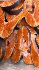 Vibrant Seafood Market: Diverse Selection of Fresh and Frozen Salmon Fish Slices Displayed in Icy Bins. Perfect for Showcasing Quality, Variety, and Culinary Delights in a Dynamic Retail Environment