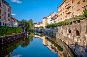Ljubljana, Slovenia – July 14, 2025: A scenic view of the Ljubljanica River as it winds through the historic center of Ljubljana.