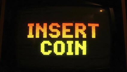 Insert coin arcade game retro gaming nostalgia vintage arcade machine classic games coin op arcade video game