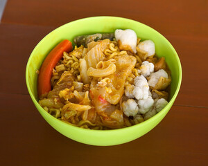 Seblak, Indonesian spicy and savory dish made from wet crackers, noodles, and various toppings