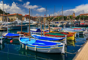 Fototapeta premium Colorful old wooden fishing boats in Lympia port of Nice, France, Cote d Azur