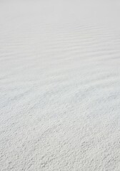 Fototapeta premium Expansive white dunes landscape with delicate ripple patterns design