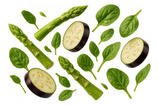 Fresh falling vegetables creating a healthy cooking concept with floating asparagus, eggplant slices, and spinach leaves on transparent background