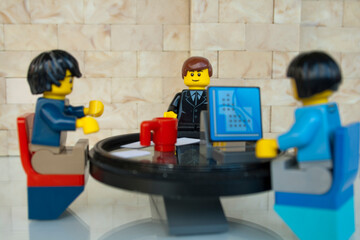 Obraz premium Lego Minifigures Business Meeting