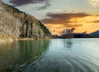 Late autumn day view of the Skagit river in Washington state during early sunrise sunset time