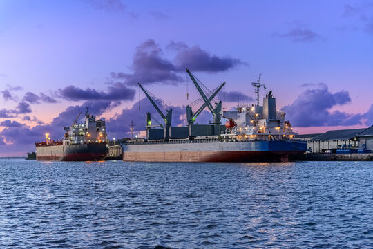 Cargo ship at sunset in the Port of Cabedelo, Para&iacute;ba, Brazil on May 27, 2023