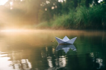 Paper boat floating on water