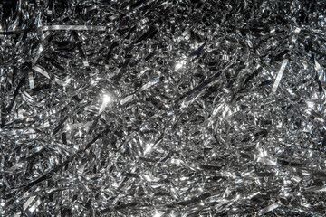 Abstract background of shiny silver tinsel foil