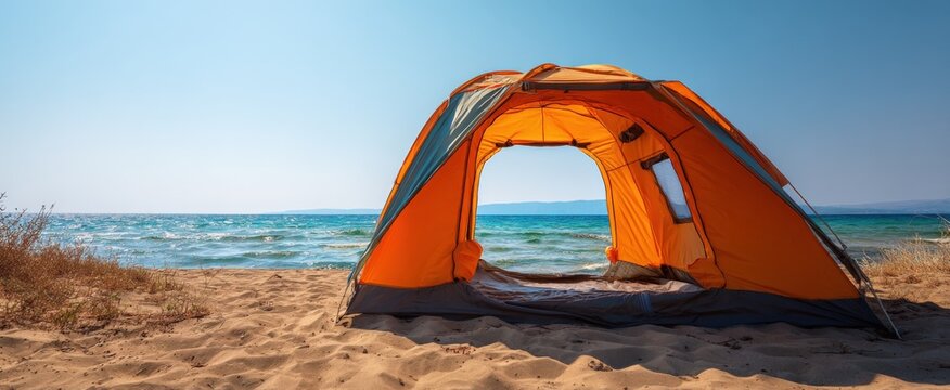 Camping tent setup on a beautiful beach with ocean view, perfect getaway and vacation spot