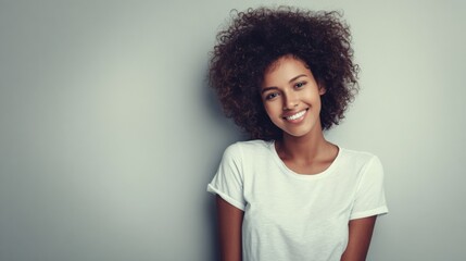 Portrait of a Beautiful Young African American Woman Smiling with Natural Curly Hair