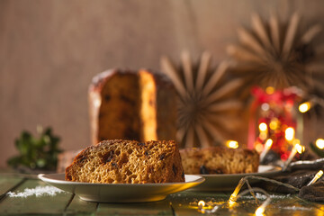 Front View of a Panettone Slice on a Plate with Soft Focus Background