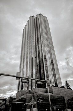 Edmonton, Alberta - October 11, 2025: The Manulife Place office tower rises against a cloudy sky in downtown Edmonton, Alberta.
