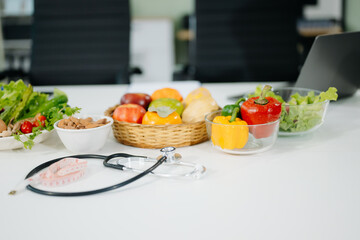 Fresh vegetables, fruits, and healthy food concepts combined with medical nutrition care, wellness, and diet planning